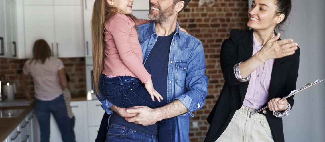 real estate agent showing home